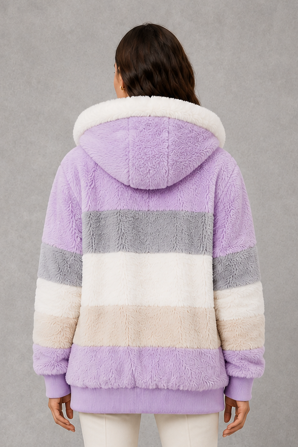 Women’s plush faux fur hooded coat with soft textured panels, rib-knit cuffs and a relaxed feminine silhouette for cozy cold-weather wear.