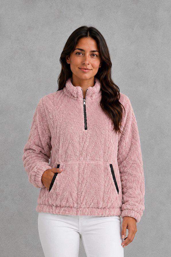 Women’s plush half-zip fleece pullover with a high stand neckline, soft fleece texture, two front pockets, long sleeves, and elasticized cuffs.