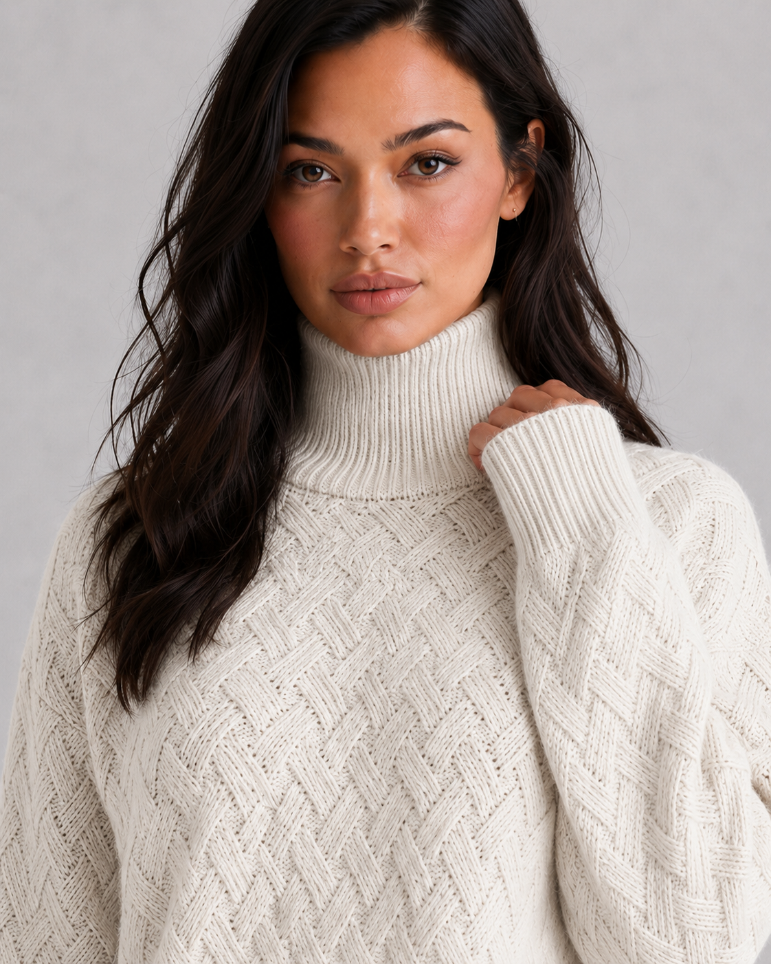 Women's cashmere chainette turtleneck sweater in a soft-touch knit with a classic high neckline and luxurious autumn-winter styling.
