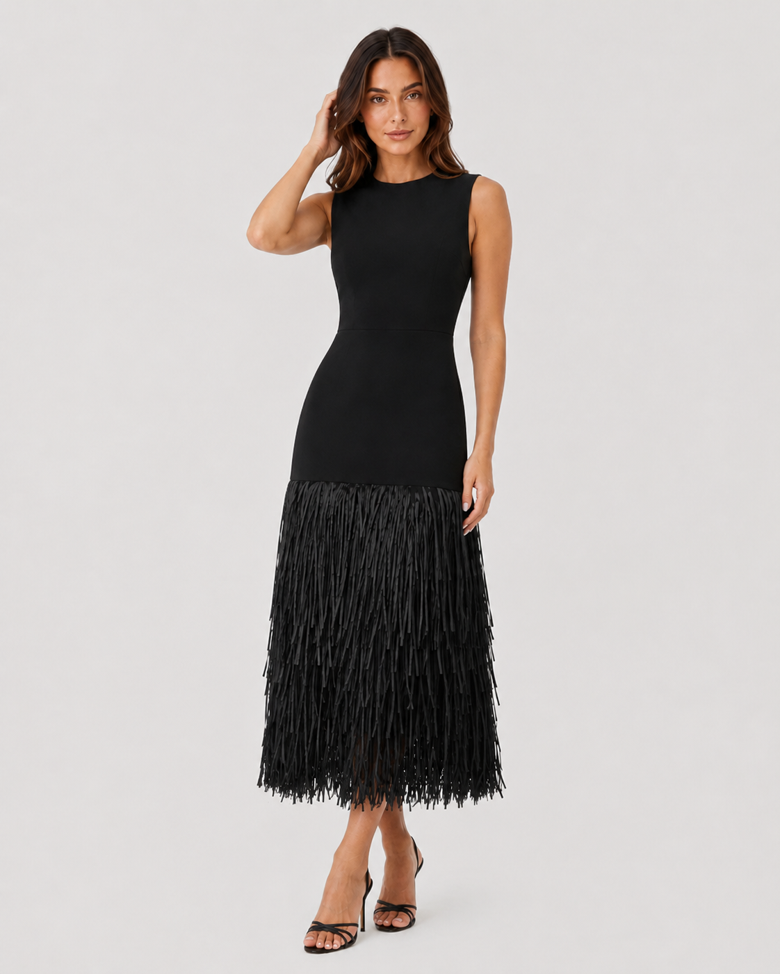 Women's raffia knit midi dress with textured weave, layered tassel detailing, and a flattering stretch-fit silhouette for warm-weather styling.