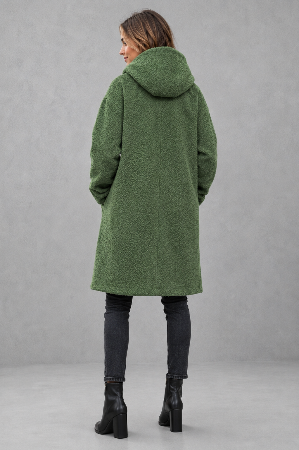Women’s relaxed fit button coat with a classic overcoat silhouette, long sleeves, lightweight construction, and elegant button-front closure.