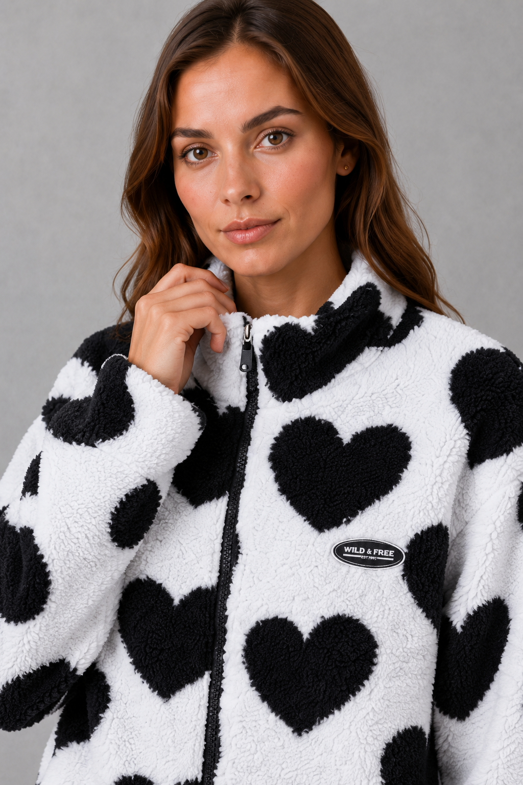 Women’s reversible heart print jacket with a lightweight soft-touch construction, feminine silhouette and versatile 2-in-1 design.