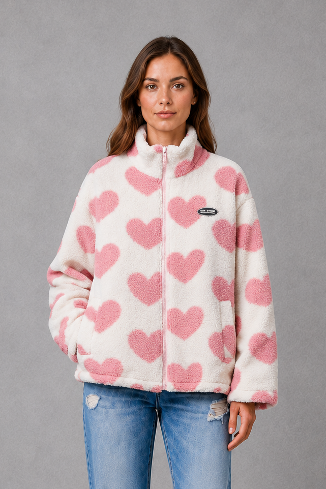 Women’s reversible heart print jacket with a lightweight soft-touch construction, feminine silhouette and versatile 2-in-1 design.
