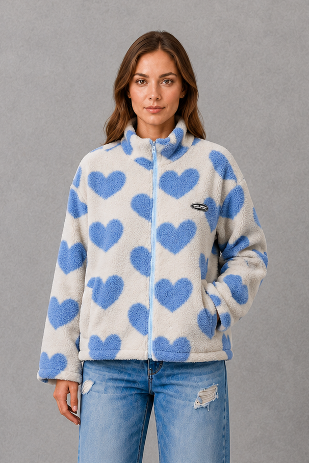 Women’s reversible heart print jacket with a lightweight soft-touch construction, feminine silhouette and versatile 2-in-1 design.