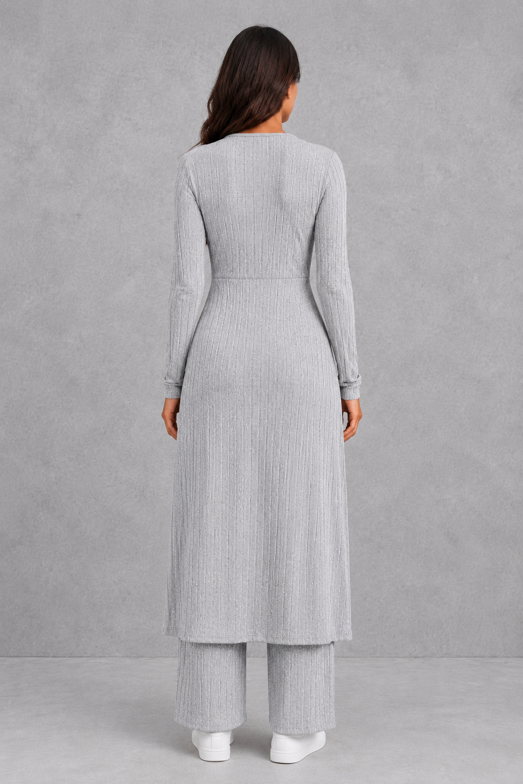 Women’s ribbed two-piece lounge set featuring a fitted long-sleeve top with a flowing longline overlay and matching high-waisted leggings.