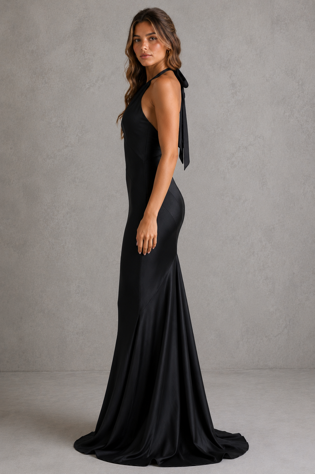 Women’s satin halter maxi dress with keyhole neckline, figure-skimming silhouette and flowing asymmetric hem.