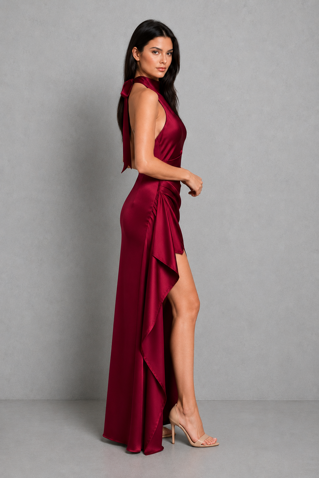 Women's satin maxi dress with a pleated cowl neckline, low scoop back, asymmetric draped detailing, thigh-high split, and fitted silhouette for elegant evening and formal occasions.