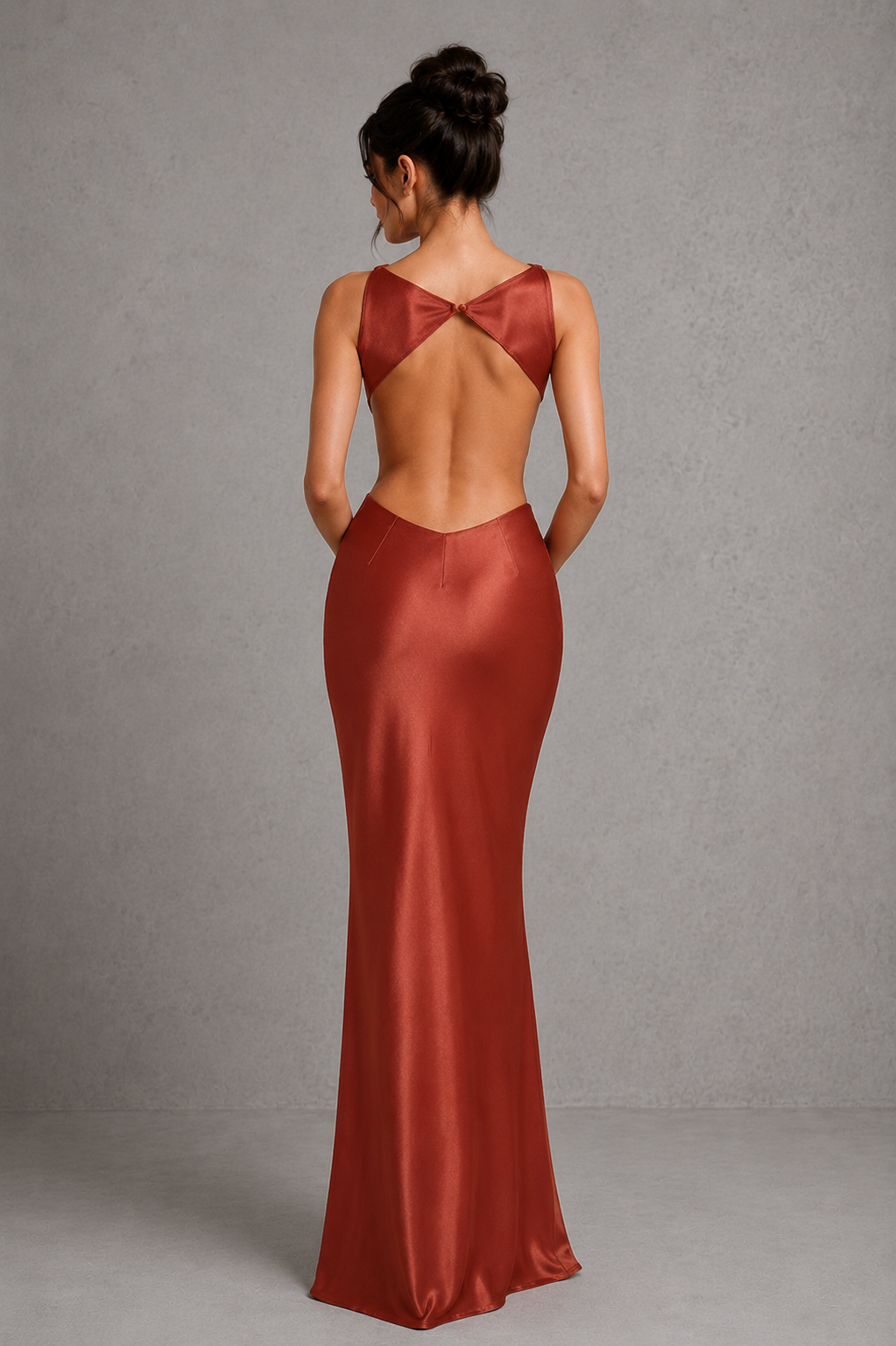 Women's satin maxi dress with a high neckline, elegant open-back detail, and figure-skimming bias-cut silhouette. Crafted from luxurious satin with a fluid drape and subtle sheen, ideal for evening events, formal occasions, weddings, and special celebrations.
