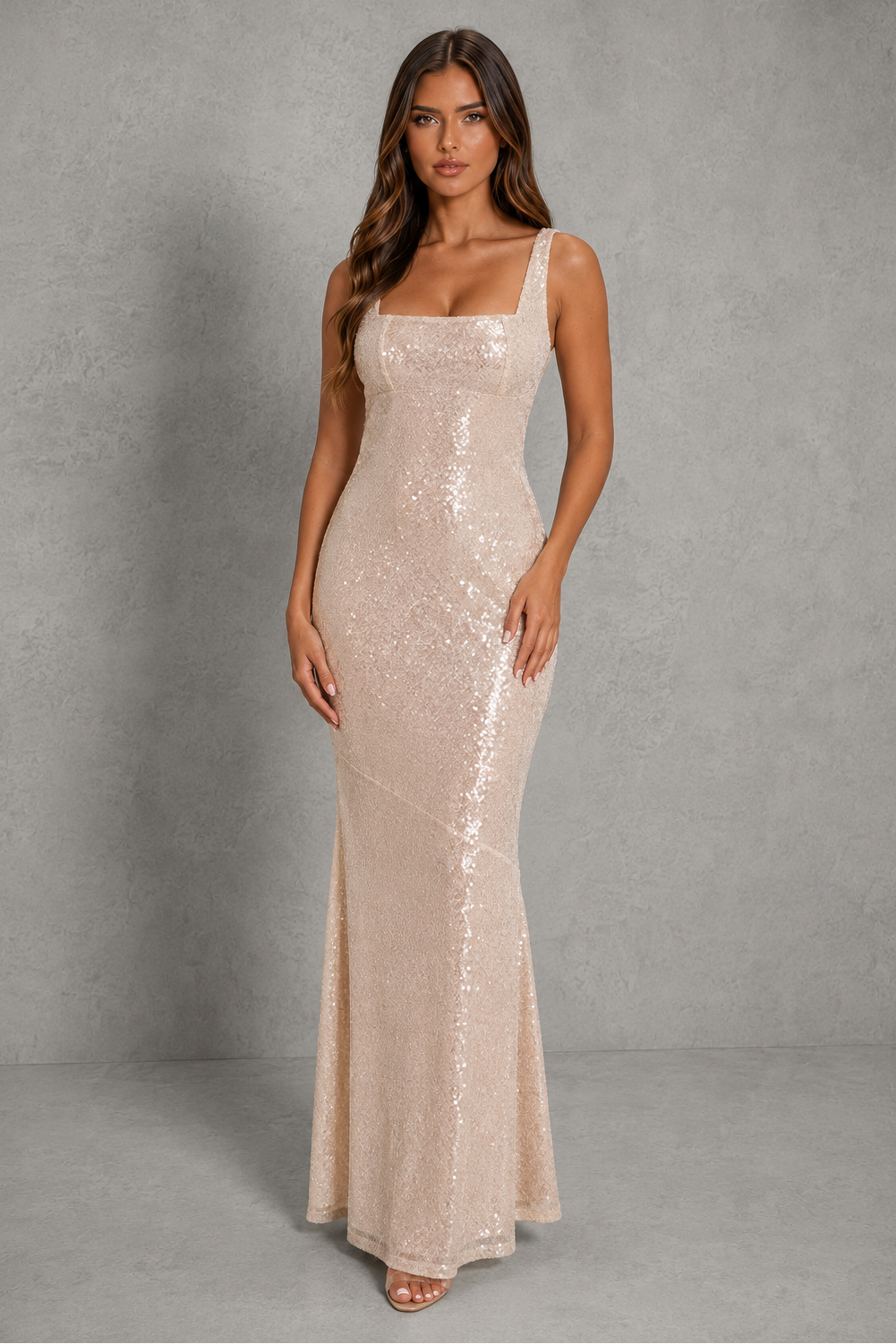 Women's sequin maxi dress with a square neckline, adjustable shoulder straps, shaped underbust seam, scoop back, bias-cut silhouette, and full-length satin-lined design for elegant evening and formal occasions.