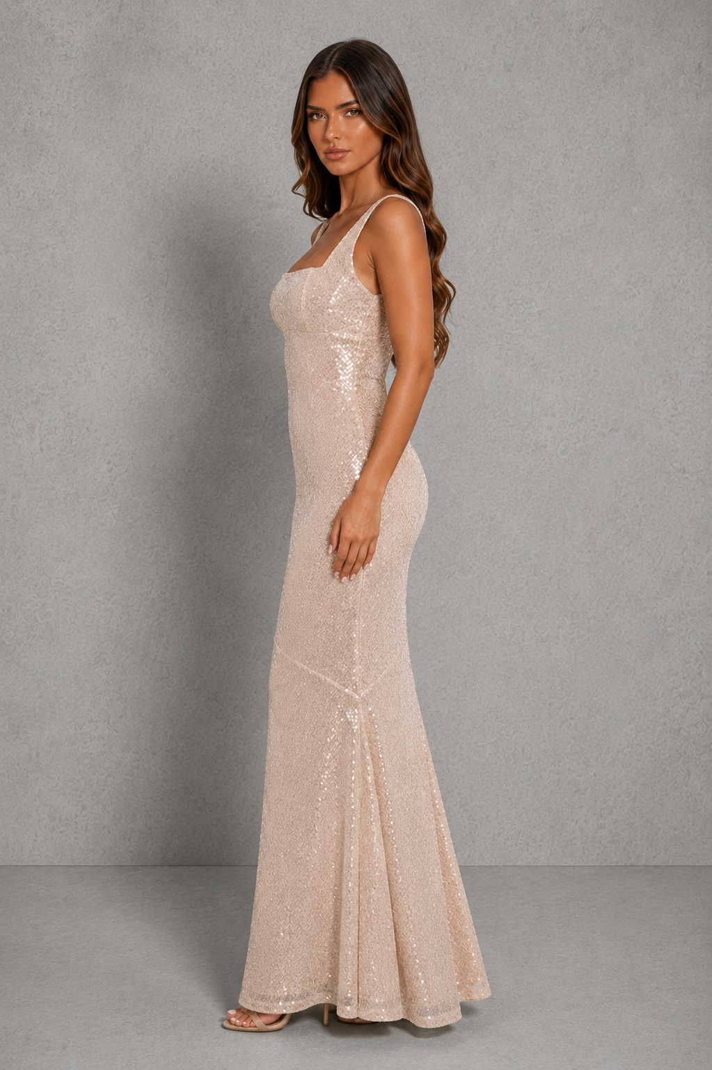 Women's sequin maxi dress with a square neckline, adjustable shoulder straps, shaped underbust seam, scoop back, bias-cut silhouette, and full-length satin-lined design for elegant evening and formal occasions.