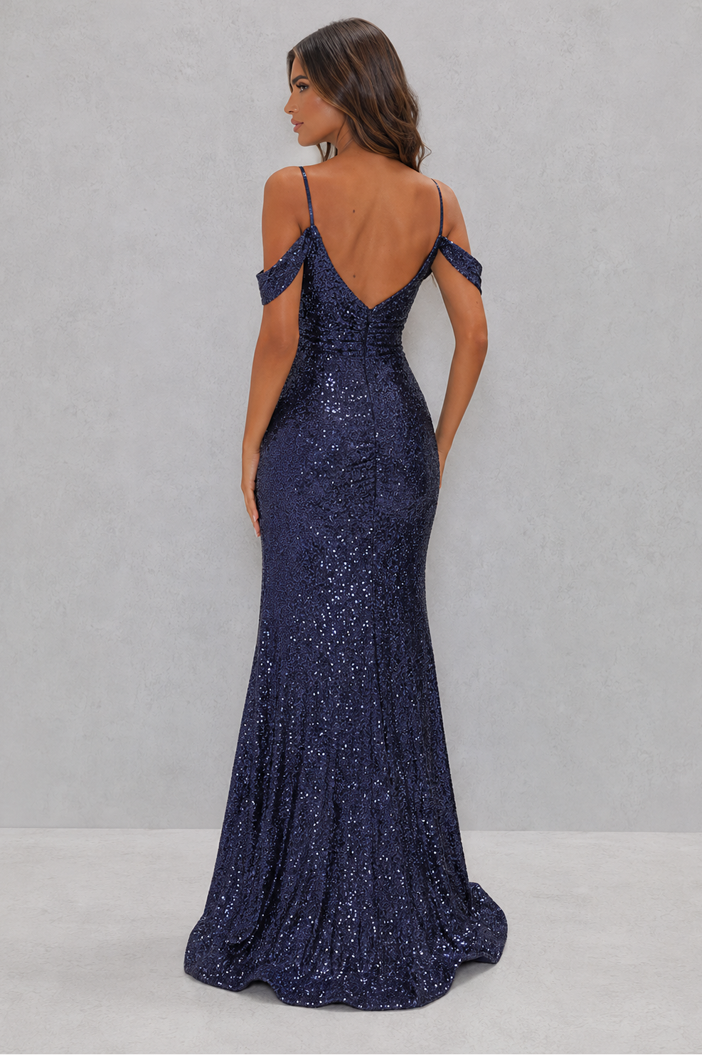 Women’s sequin mermaid maxi dress with a sweetheart neckline, off-shoulder straps, high side slit, fitted silhouette, and sparkling floor-length hem.
