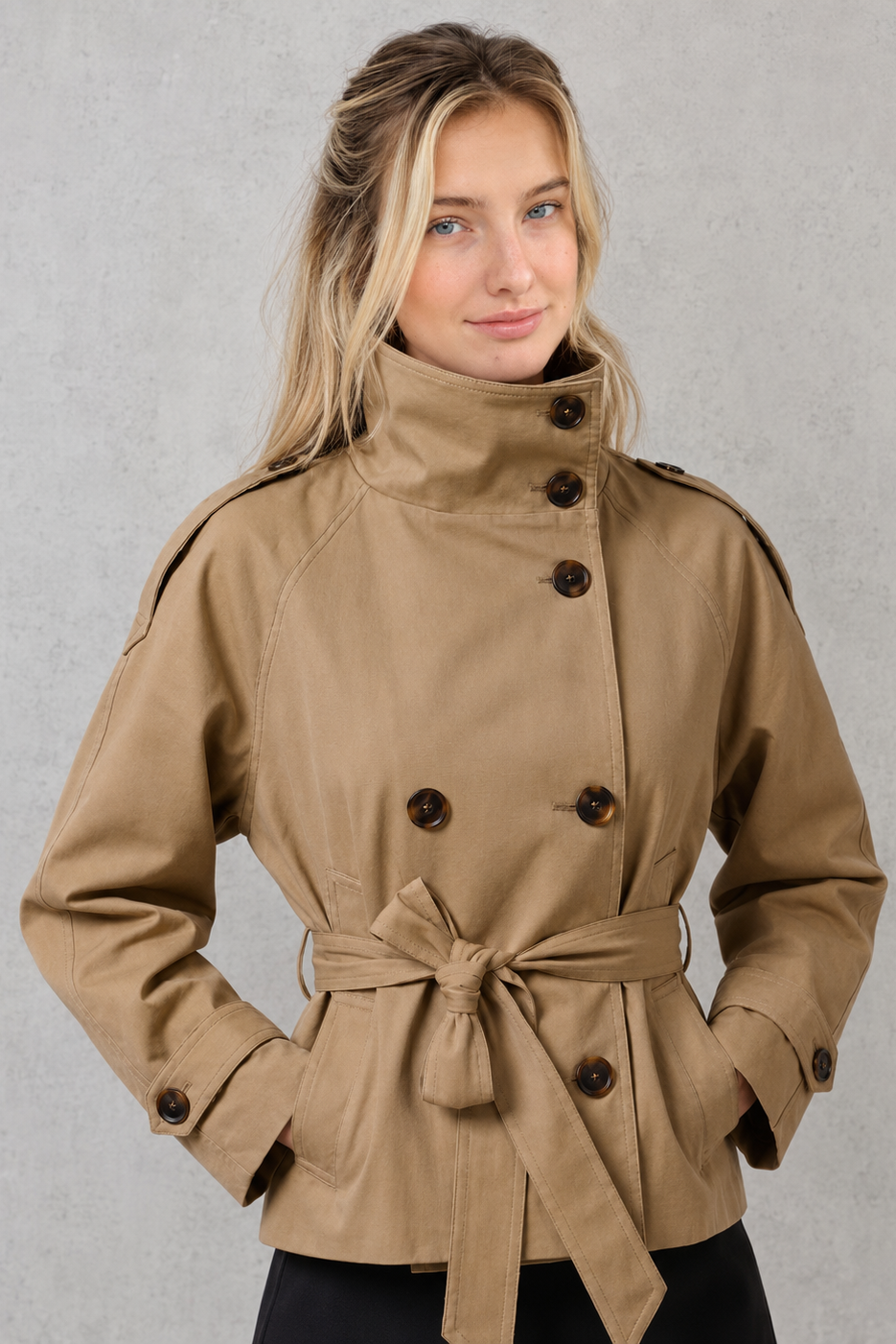 Women’s short belted trench coat with a lightweight tailored silhouette, adjustable waist belt, and classic trench-inspired styling.
