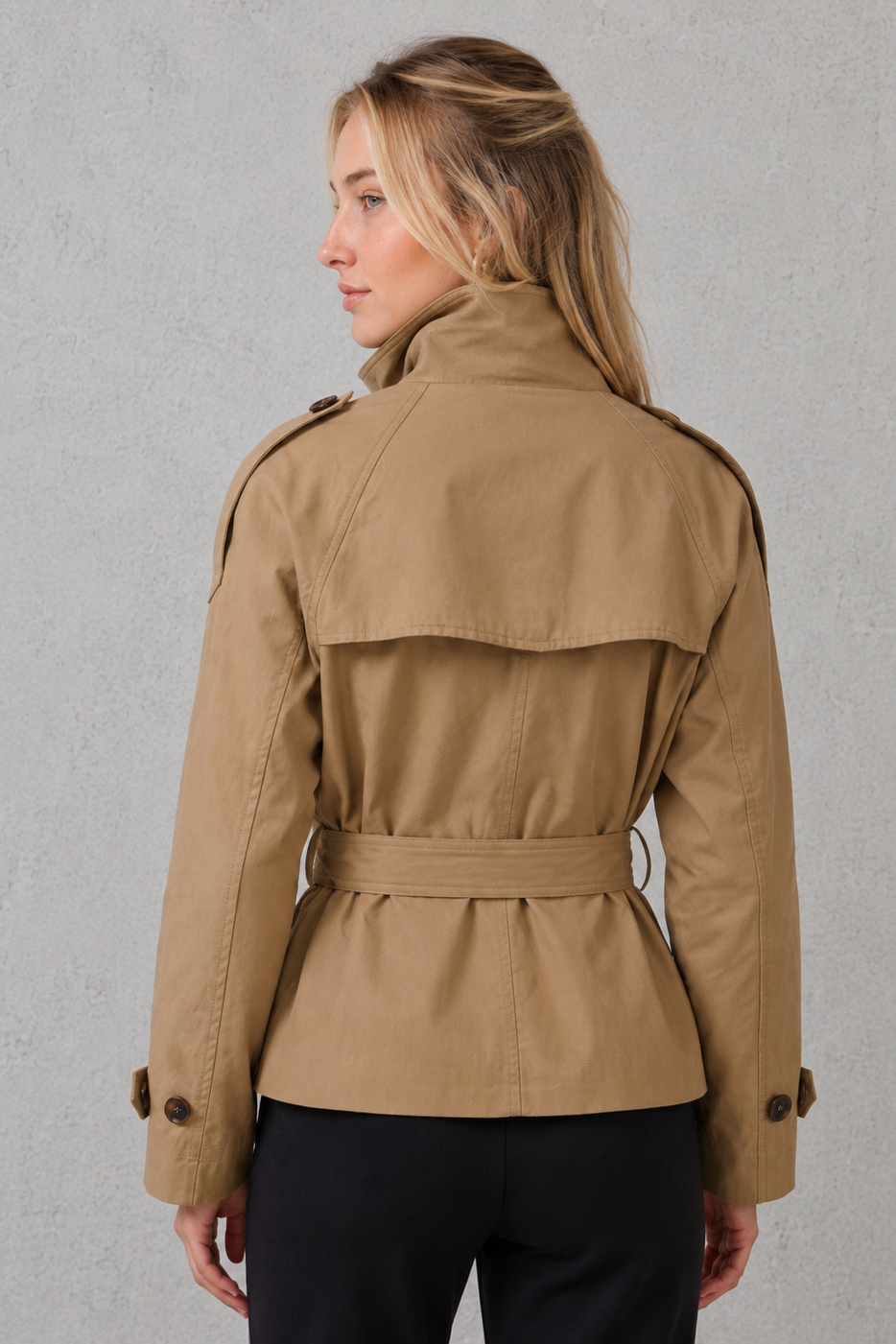 Women’s short belted trench coat with a lightweight tailored silhouette, adjustable waist belt, and classic trench-inspired styling.
