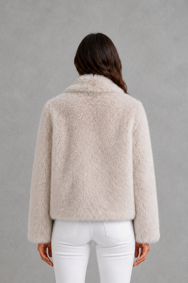 Women’s sleek faux fur jacket with a soft plush exterior, streamlined silhouette, comfortable lining, and elegant regular fit for cold-weather styling.