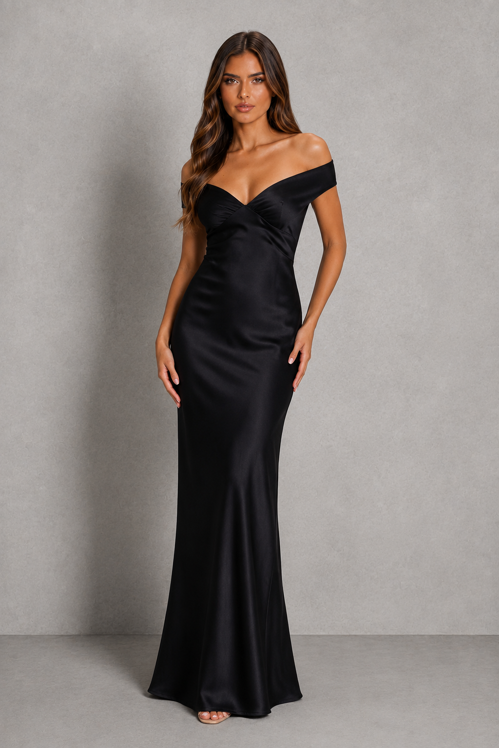 Women’s sleeveless formal maxi dress with a streamlined bodice, flowing floor-length skirt, smooth finish, and elegant minimalist silhouette.