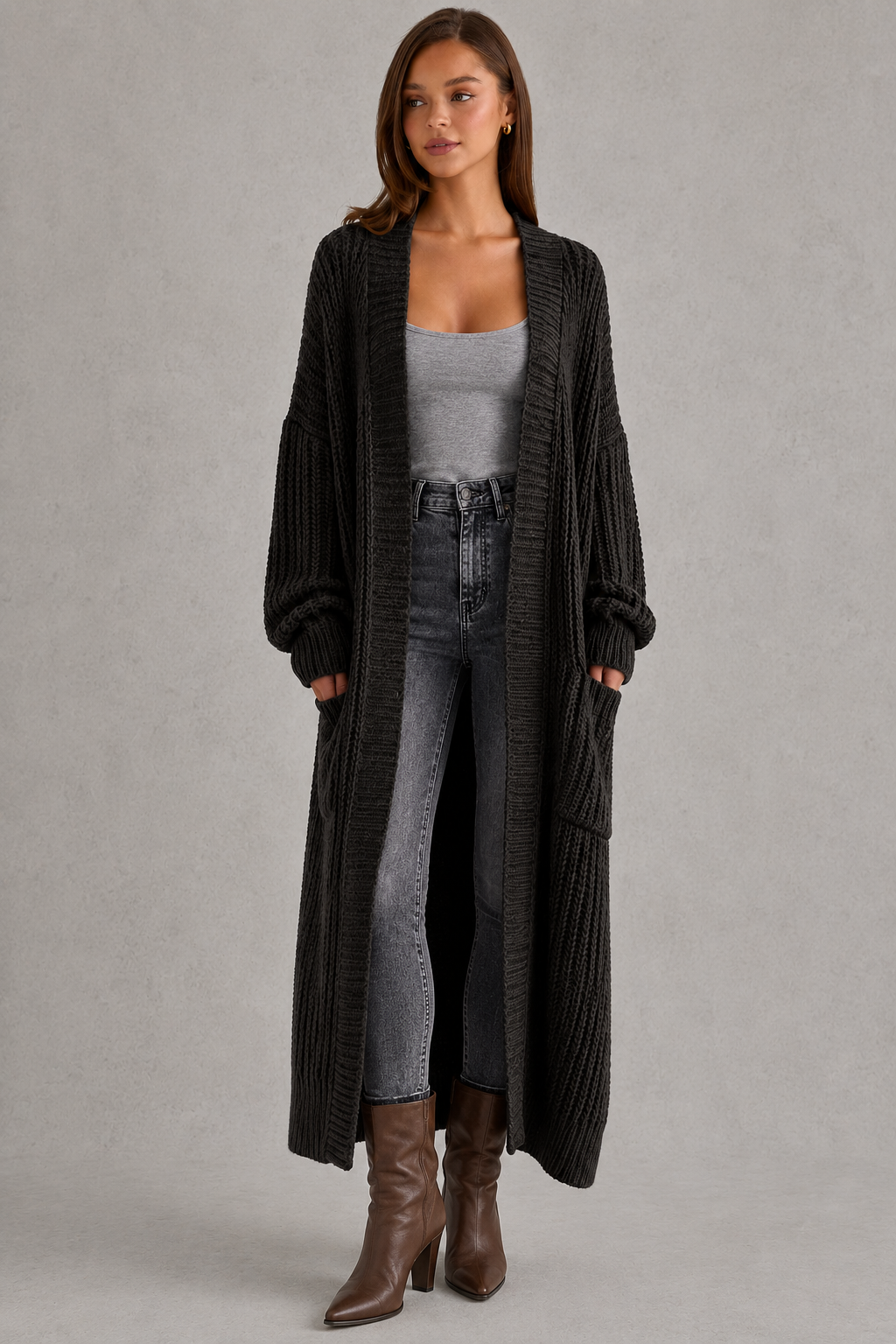 Woman wearing a relaxed-fit V-neck button cardigan sweater with a soft knit texture, styled for elegant autumn and winter layering.