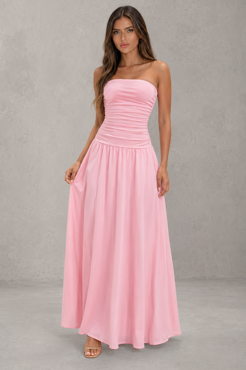 Women’s strapless ruched maxi dress with a fitted gathered bodice and flowing full-length skirt for weddings, formal events, and evening wear.