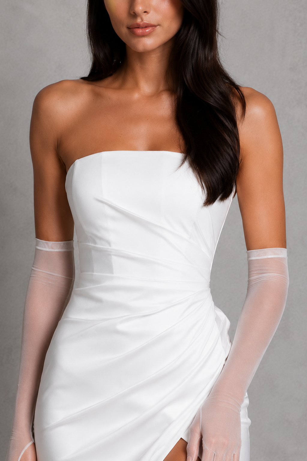 Women's strapless heavy stretch satin maxi dress with a hidden corset, draped bust detail, body-hugging fit, thigh-high split, and flowing skirt, perfect for evening events and formal occasions.