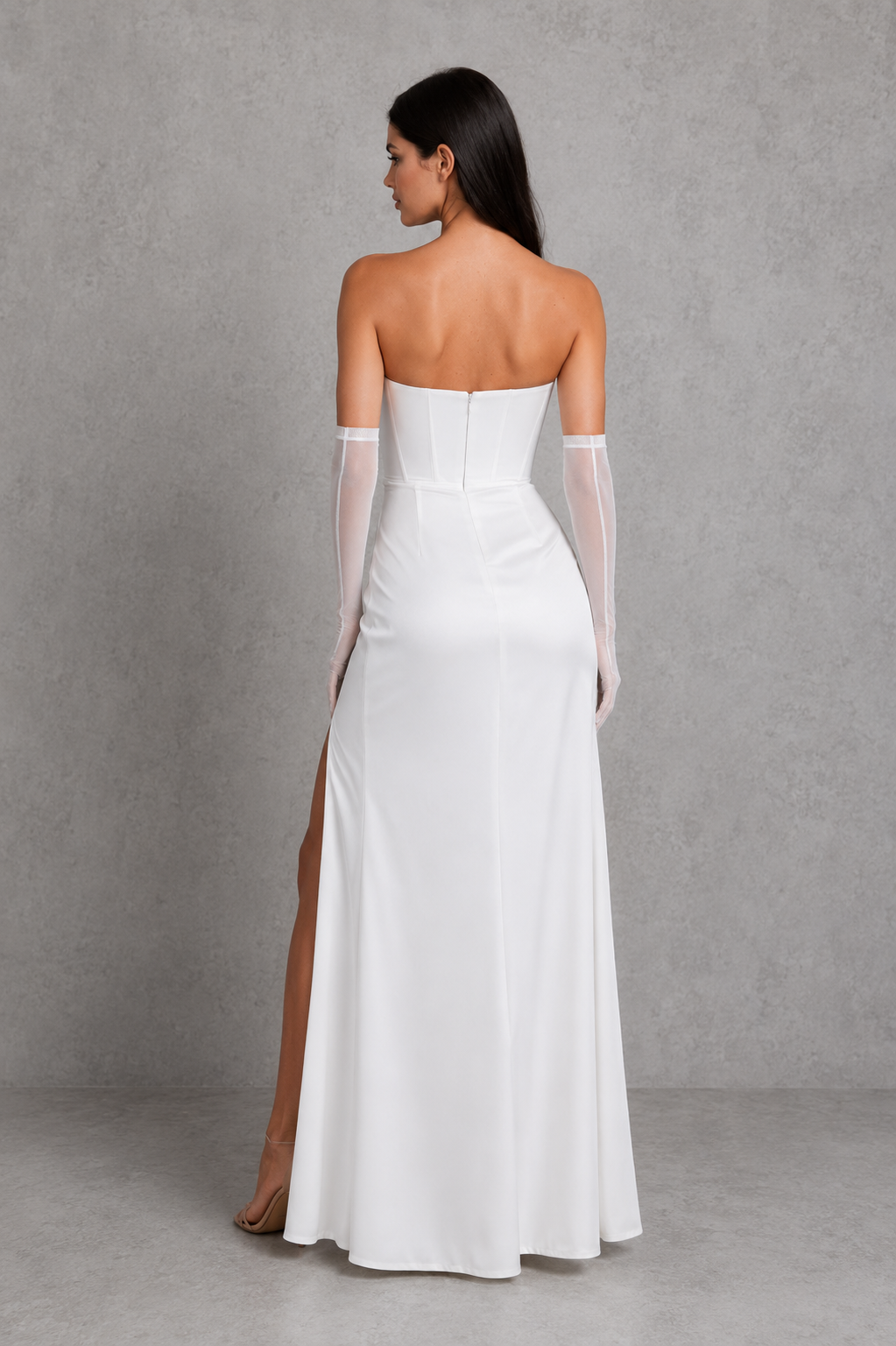 Women's strapless heavy stretch satin maxi dress with a hidden corset, draped bust detail, body-hugging fit, thigh-high split, and flowing skirt, perfect for evening events and formal occasions.
