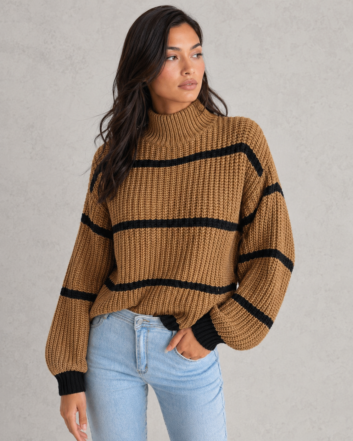 Women's striped knit turtleneck sweater with relaxed fit, lantern sleeves, and mock neck in a timeless autumn-winter design.