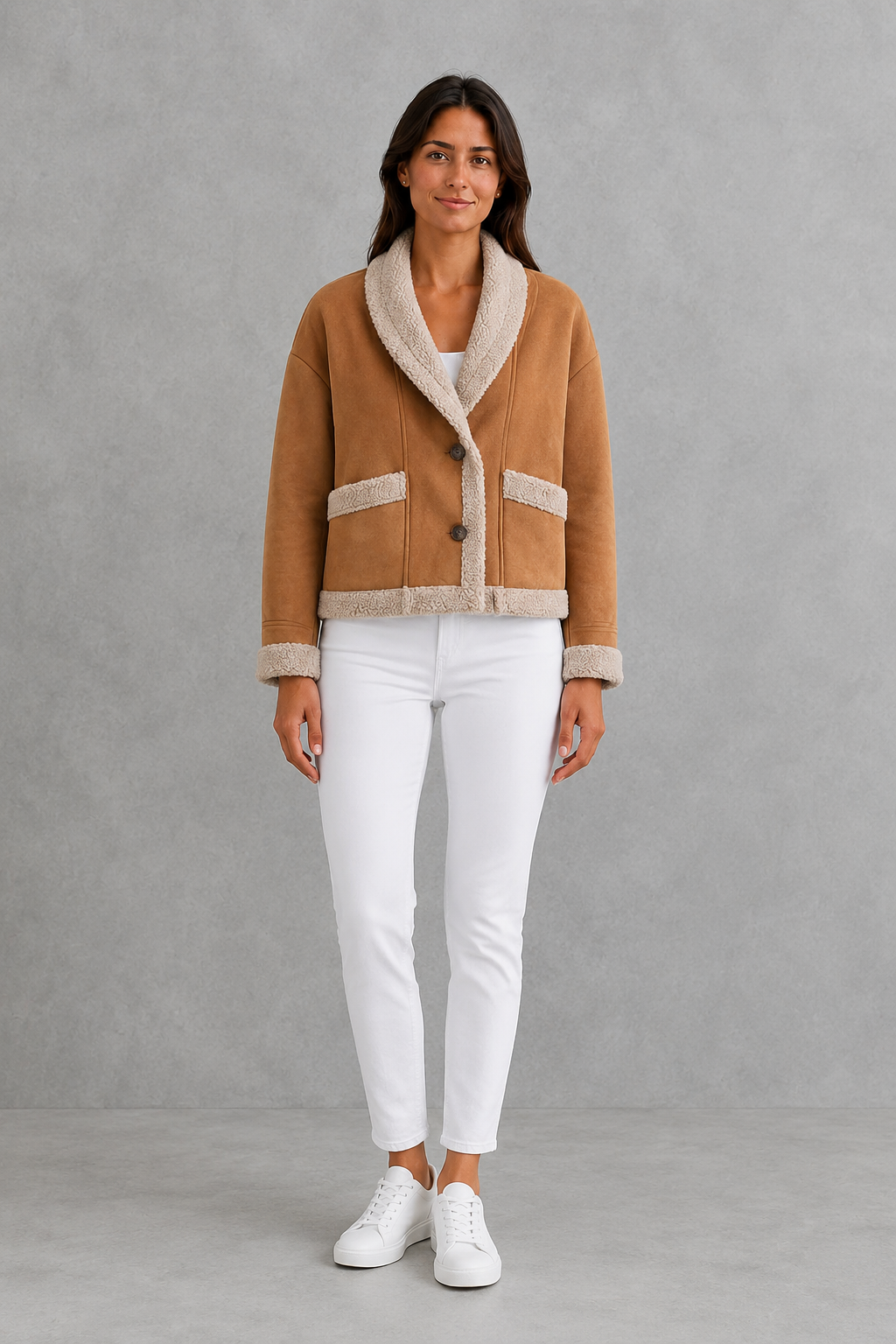 Women’s suede-look teddy coat with a soft textured finish, classic lapel collar, long sleeves, and a relaxed silhouette for comfortable layering.
