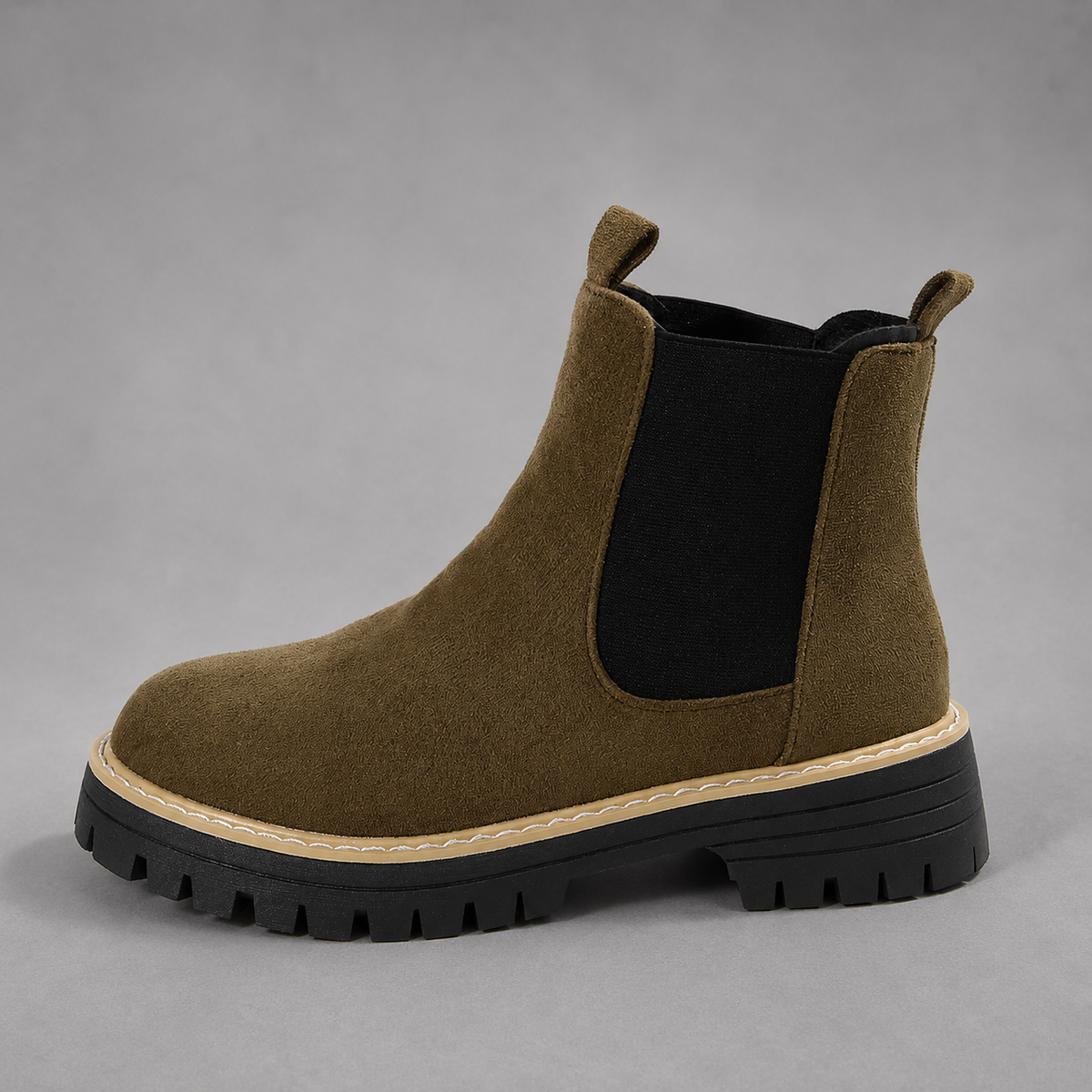 Women’s suede ankle boots with a soft suede upper, classic round toe, supportive mid-height block heel, and durable rubber outsole.