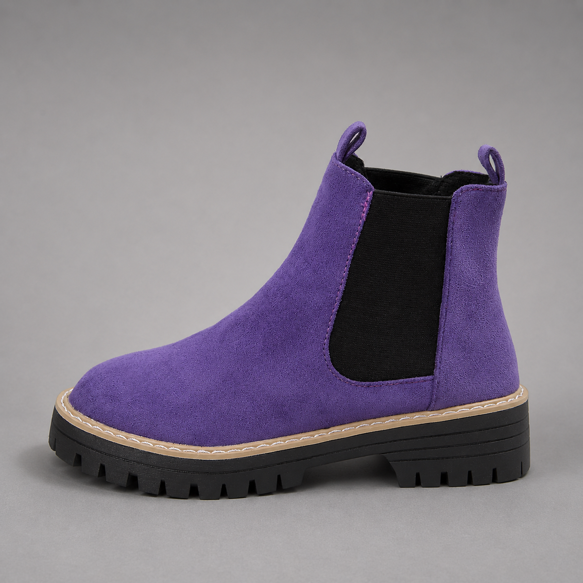 Women’s suede ankle boots with a soft suede upper, classic round toe, supportive mid-height block heel, and durable rubber outsole.