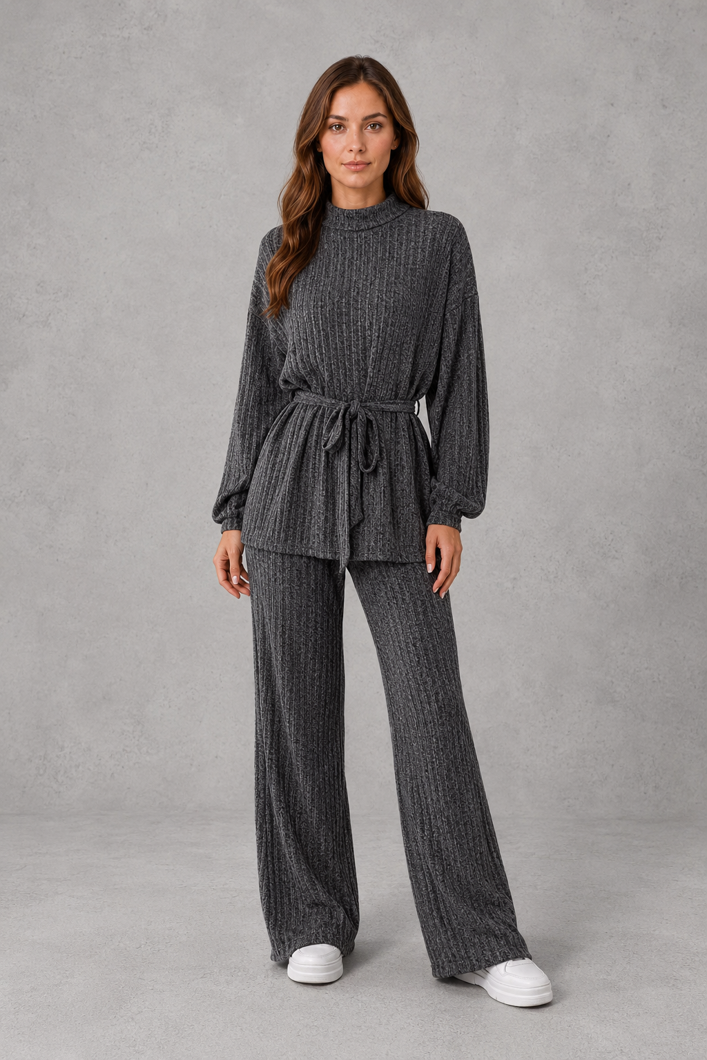Women’s turtleneck knit two-piece set featuring a long-sleeve ribbed top with an adjustable tie waist and matching wide-leg pants.