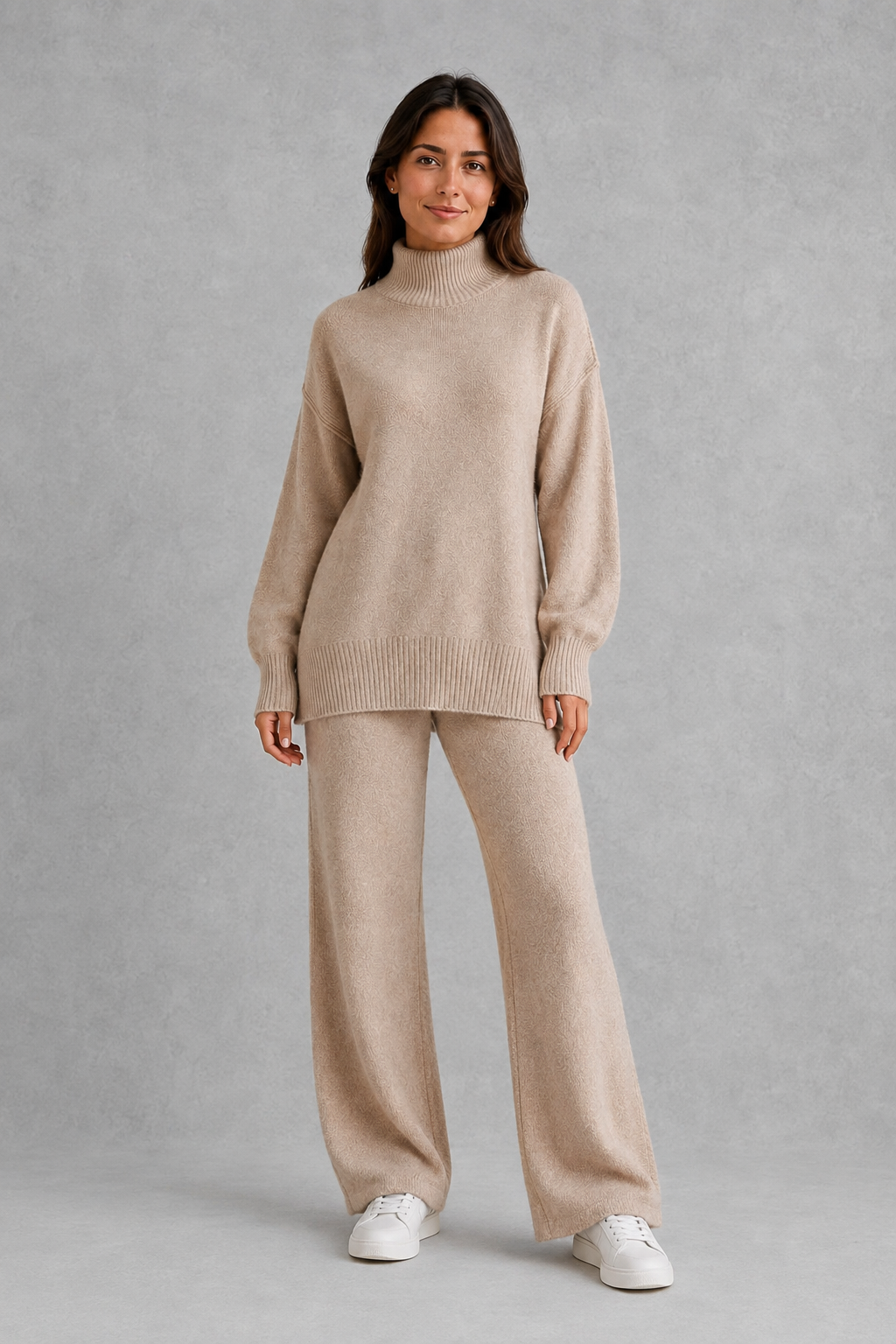 Women’s turtleneck sweater and pants set with an oversized ribbed high-neck sweater, dropped shoulders, long sleeves, and matching wide-leg knit pants.