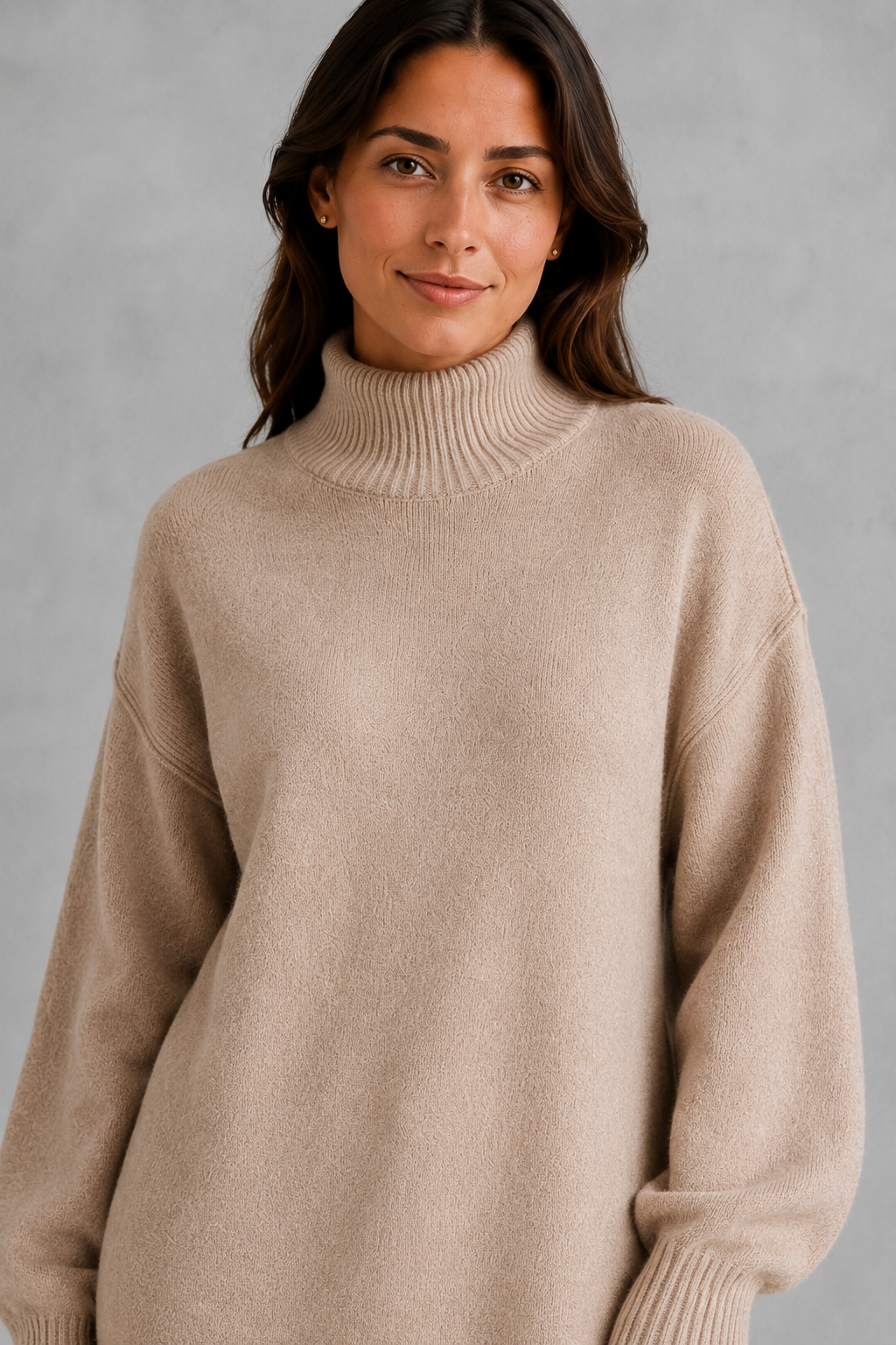 Women’s turtleneck sweater and pants set with an oversized ribbed high-neck sweater, dropped shoulders, long sleeves, and matching wide-leg knit pants.