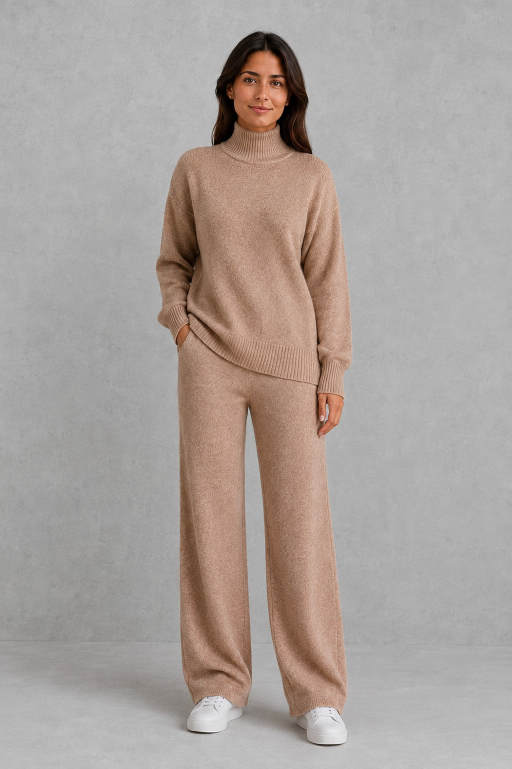 Women’s turtleneck sweater and pants set with an oversized ribbed high-neck sweater, dropped shoulders, long sleeves, and matching wide-leg knit pants.