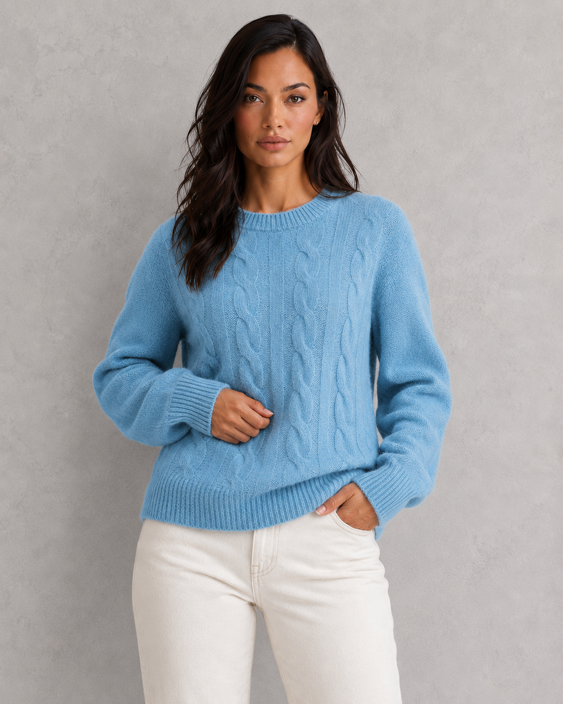 Woman wearing an ultra-soft knitted jumper with a relaxed fit, cozy texture, and modern silhouette styled for effortless everyday elegance.