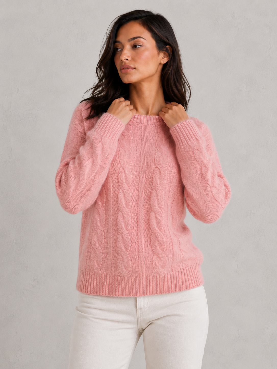 Woman wearing an ultra-soft knitted jumper with a relaxed fit, cozy texture, and modern silhouette styled for effortless everyday elegance.