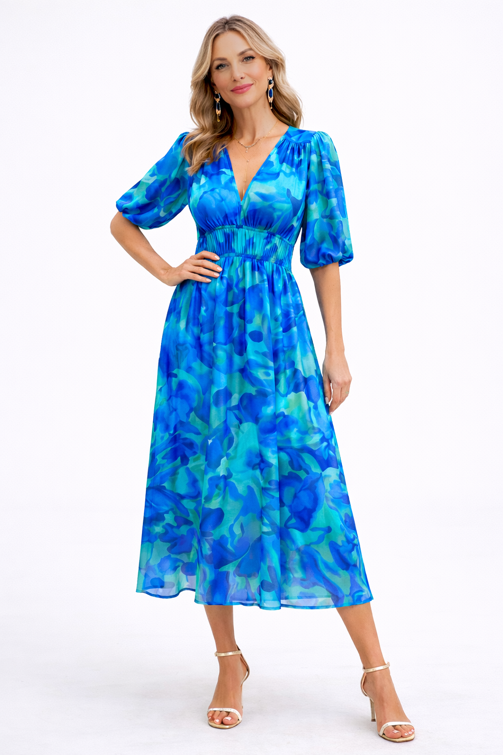 Woman wearing a blue floral dress on a white background