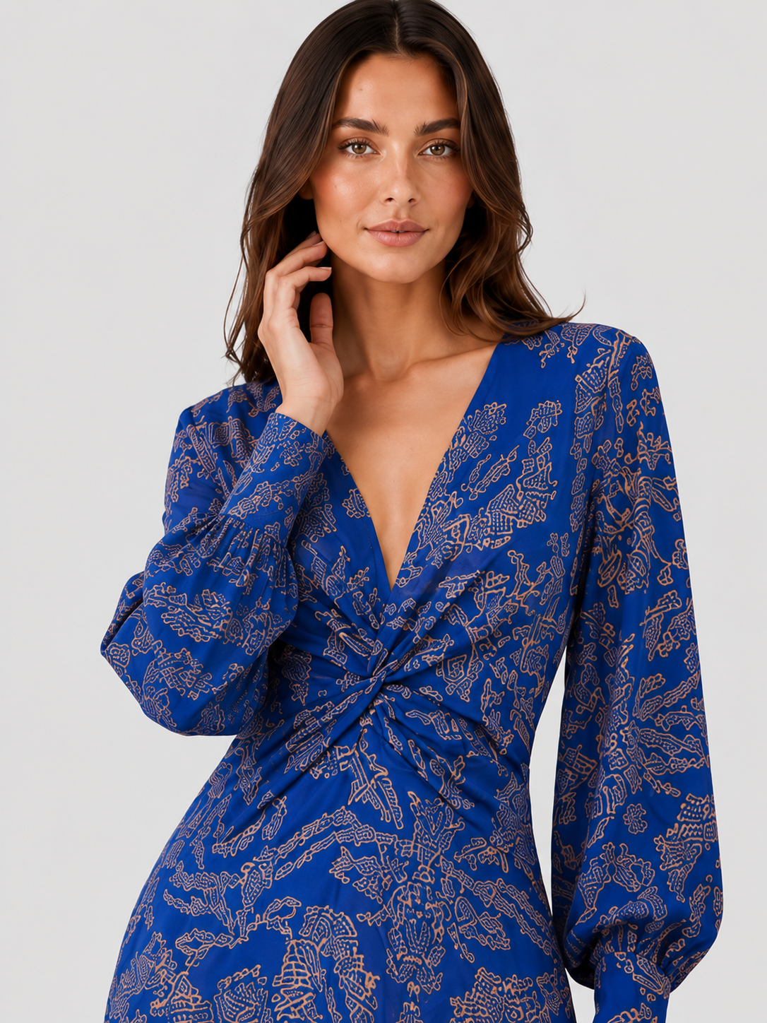 Women's V-neck midi cocktail dress by Klyne Studios made from structured fabric with a figure-shaped silhouette. Features a flattering V-neckline, midi length, and true-to-size fit. Available in Blue, Green, Red, and Purple, in sizes S–3XL.