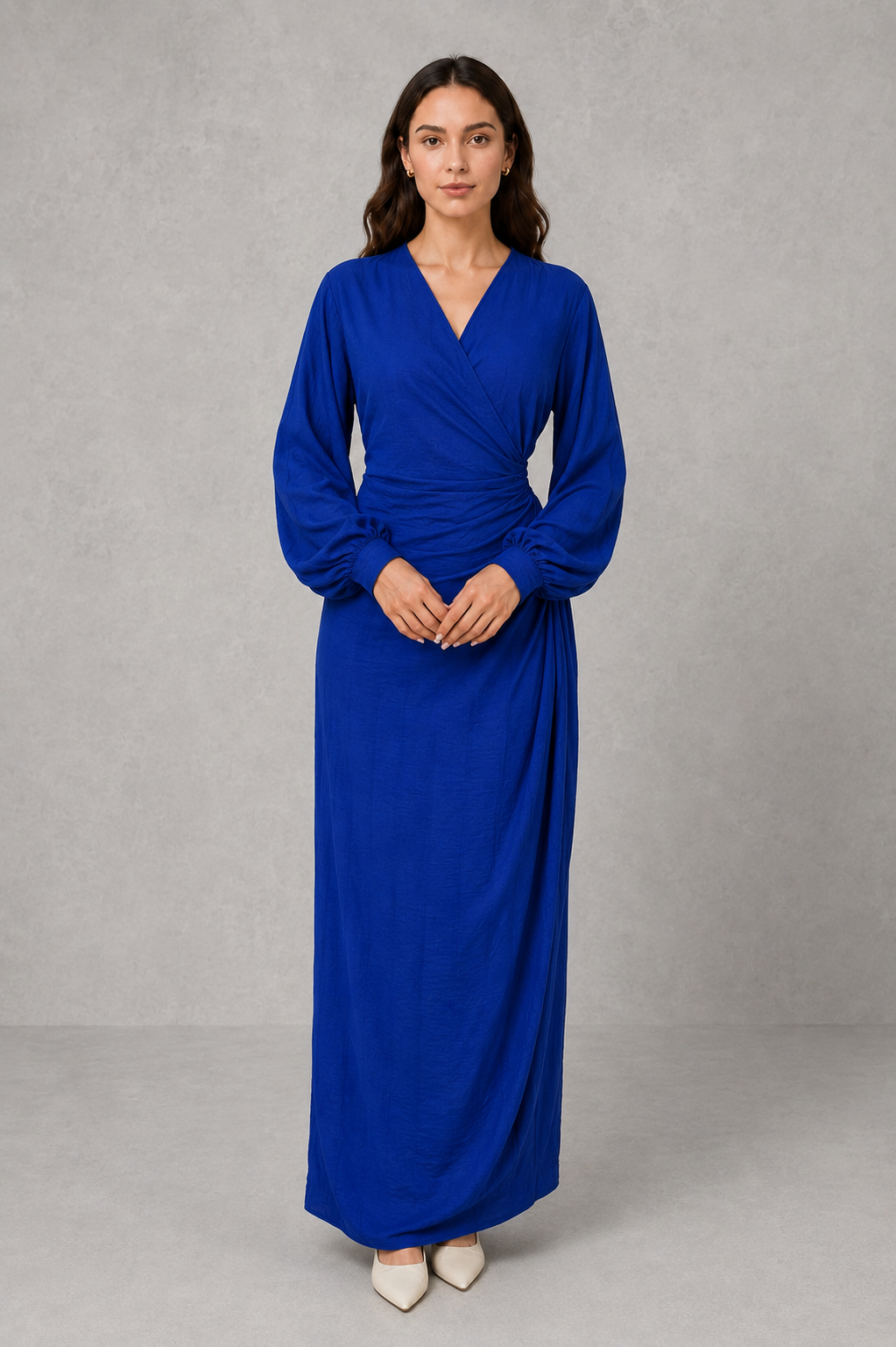 Women’s V-neck ruched wrap maxi dress with a draped front, gathered waist, long cuffed sleeves, flowing full-length skirt, and subtle side slit.