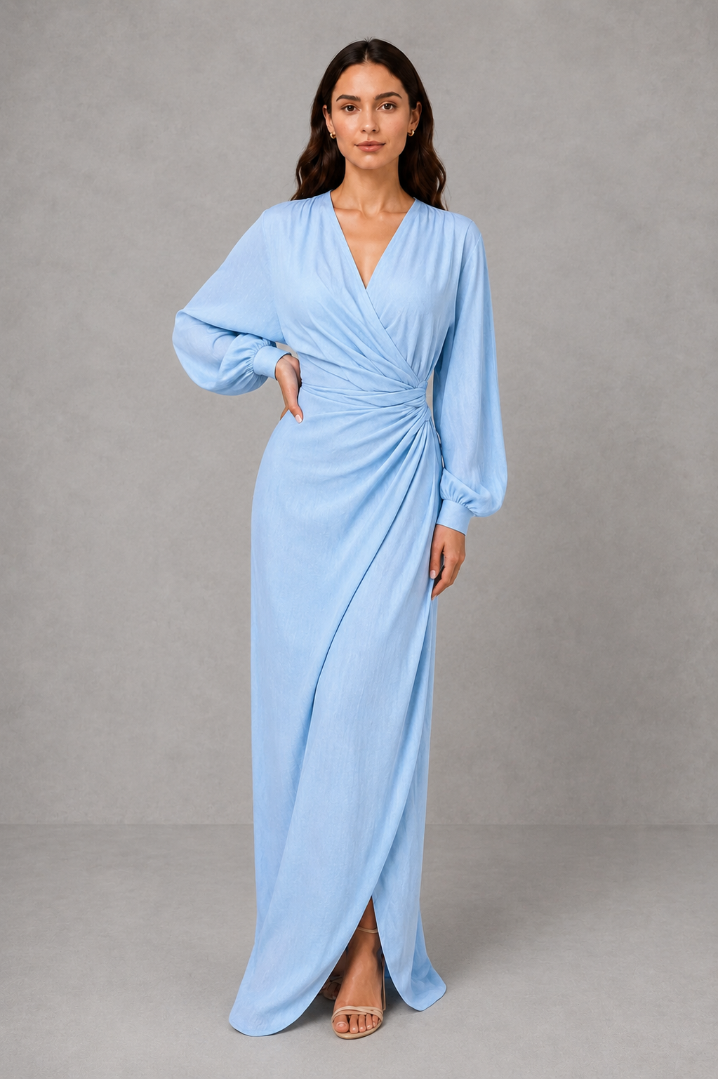 Women’s V-neck ruched wrap maxi dress with a draped front, gathered waist, long cuffed sleeves, flowing full-length skirt, and subtle side slit.