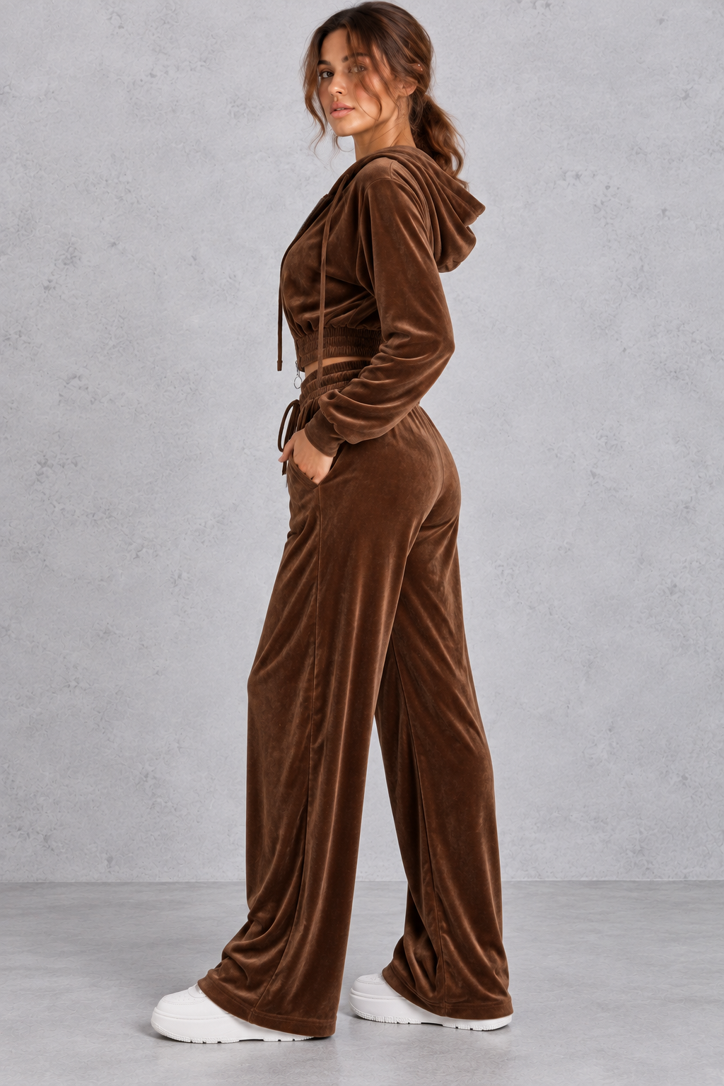Back view of the velvet tracksuit showing the drawstring hood