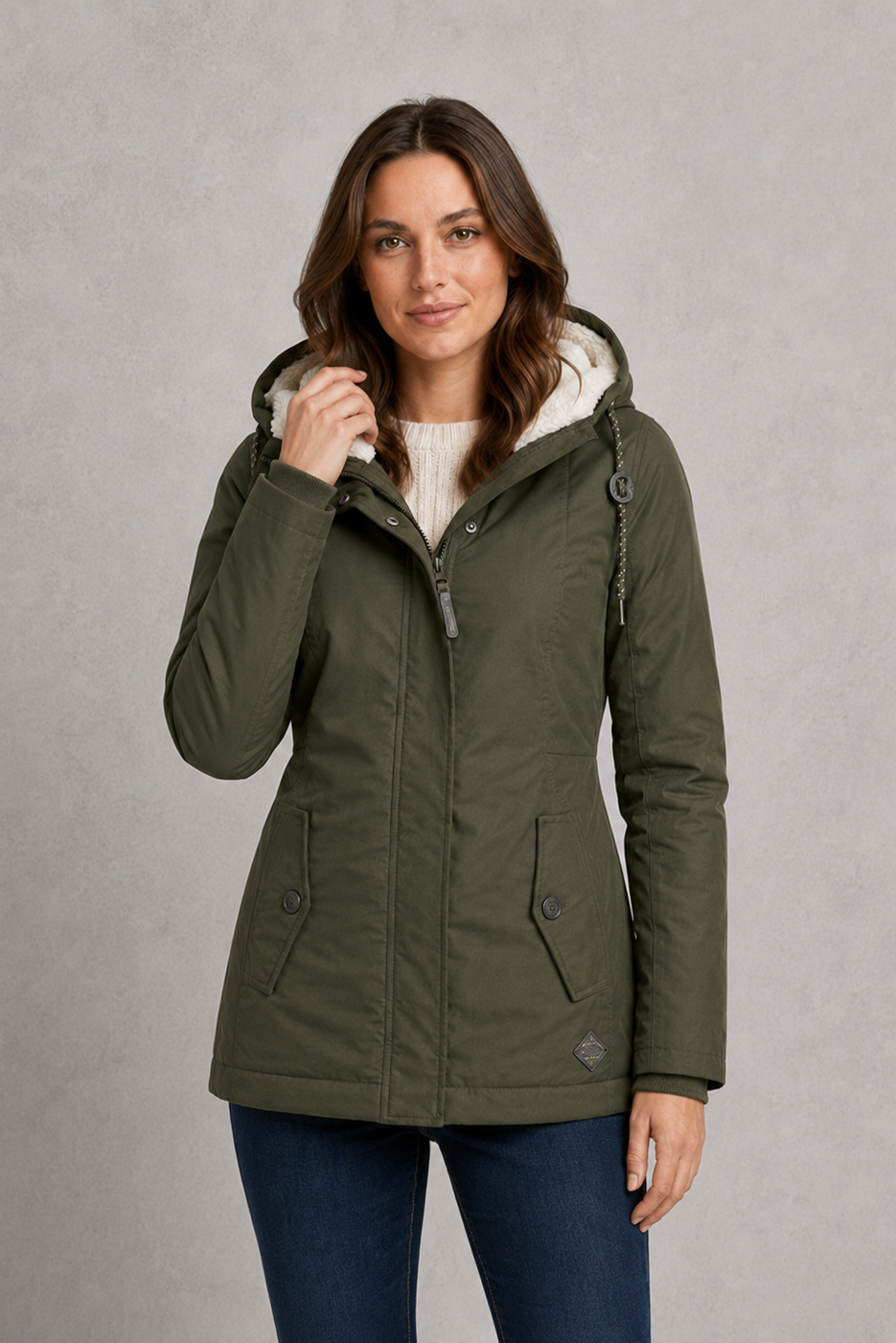 Women’s waterproof hooded longline rain coat with an adjustable hood, insulated lining, regular fit, and extended length for added weather protection.