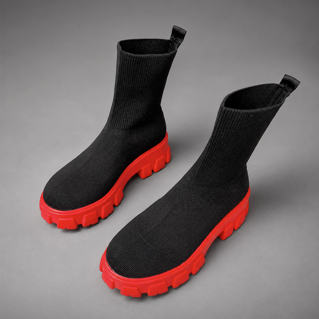 Women's waterproof stretch ankle boots with a faux fur lining, slip-on design, lace-up detail and non-slip rubber sole for warm, comfortable everyday autumn and winter wear.