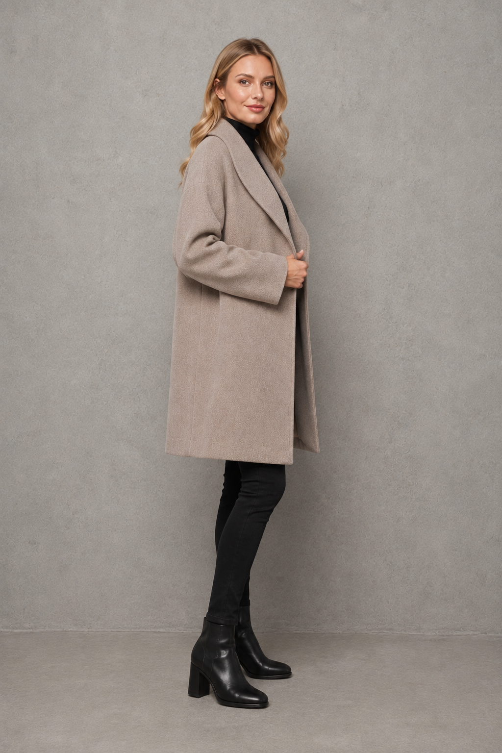 Women’s windproof winter coat with an elegant longline silhouette, relaxed fit, long sleeves, and soft lightweight fabric for comfortable layering.