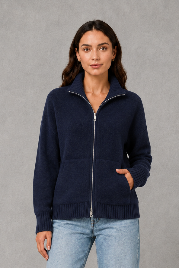 Women’s zip-up funnel neck cardigan with soft knit fabric, full front zipper, patch pockets, long sleeves, and ribbed cuffs and hem.