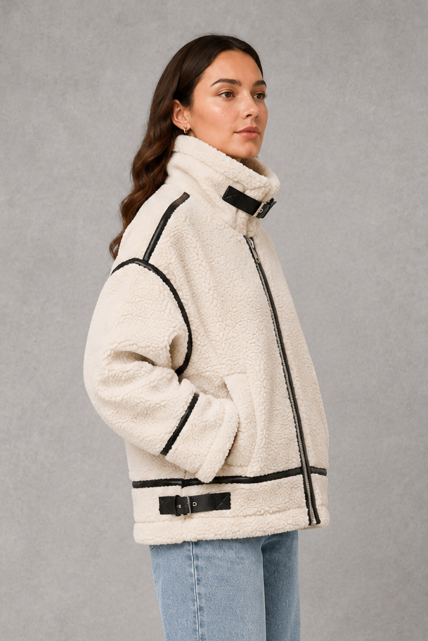 Women’s zip-up sherpa teddy coat with a soft plush texture, warm interior, front zipper and relaxed silhouette for cozy cold-weather layering.