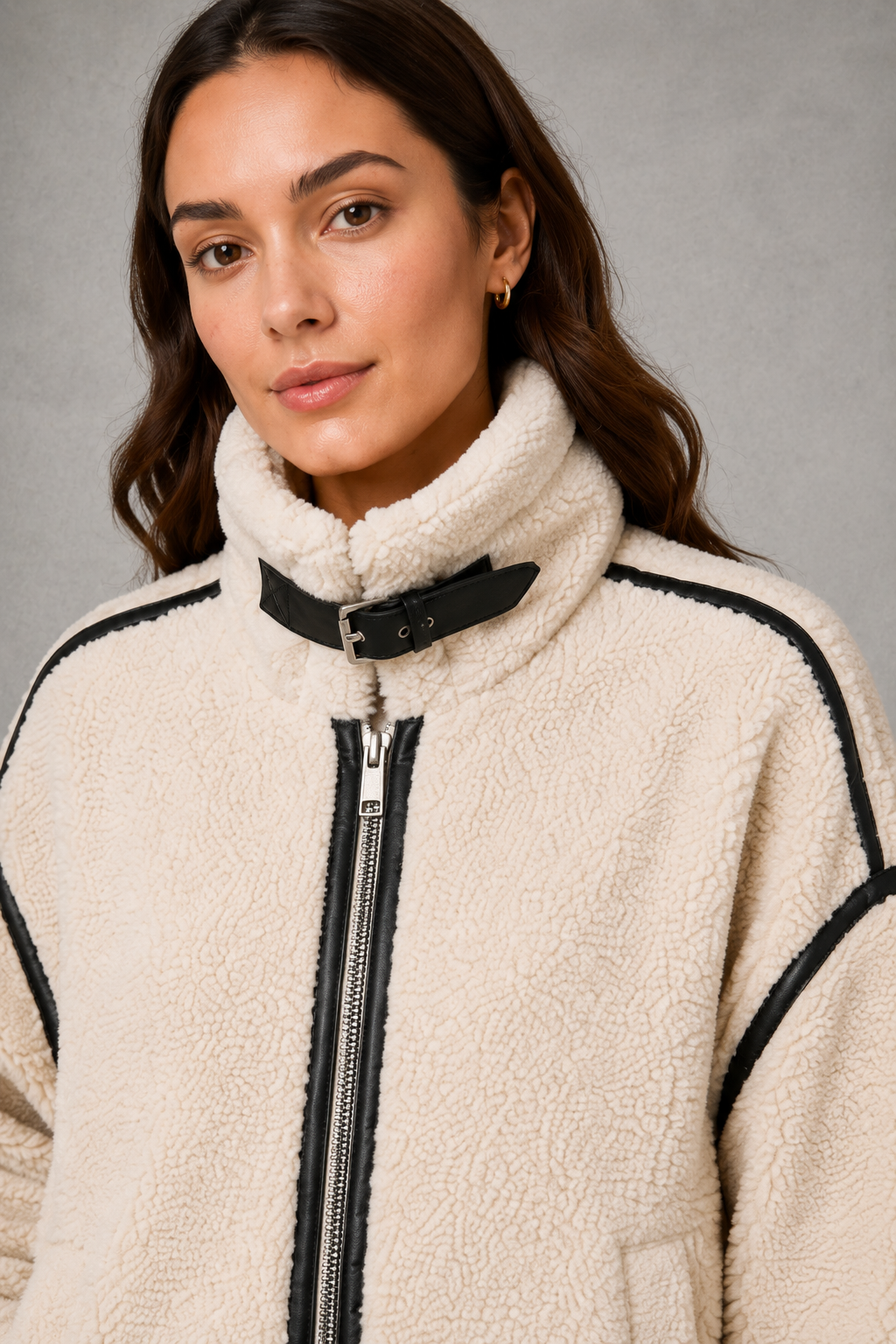 Women’s zip-up sherpa teddy coat with a soft plush texture, warm interior, front zipper and relaxed silhouette for cozy cold-weather layering.