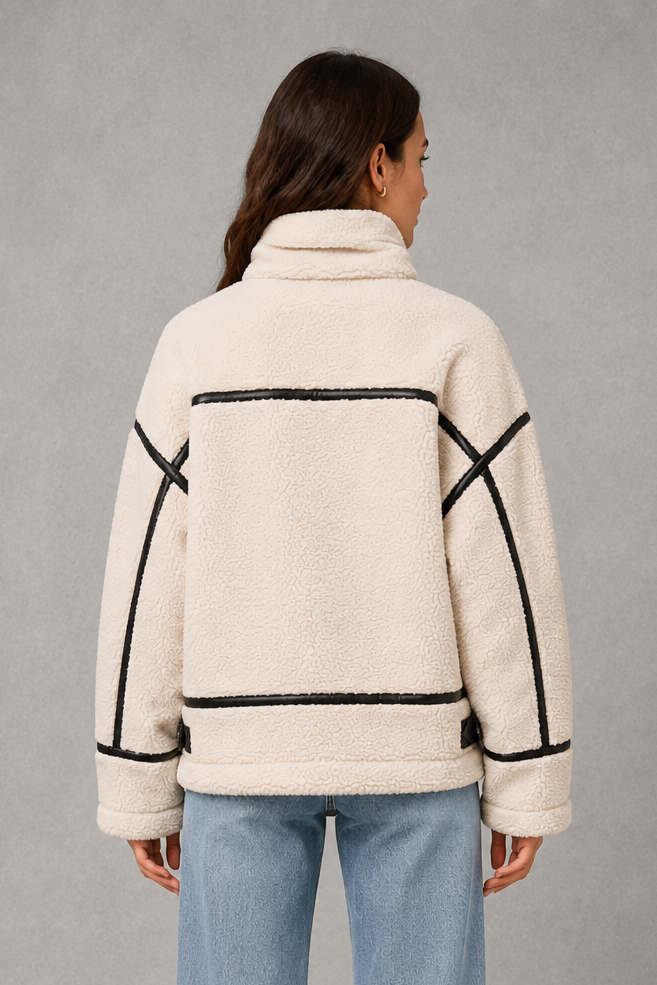 Women’s zip-up sherpa teddy coat with a soft plush texture, warm interior, front zipper and relaxed silhouette for cozy cold-weather layering.