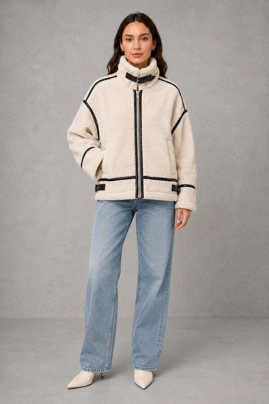 Women’s zip-up sherpa teddy coat with a soft plush texture, warm interior, front zipper and relaxed silhouette for cozy cold-weather layering.