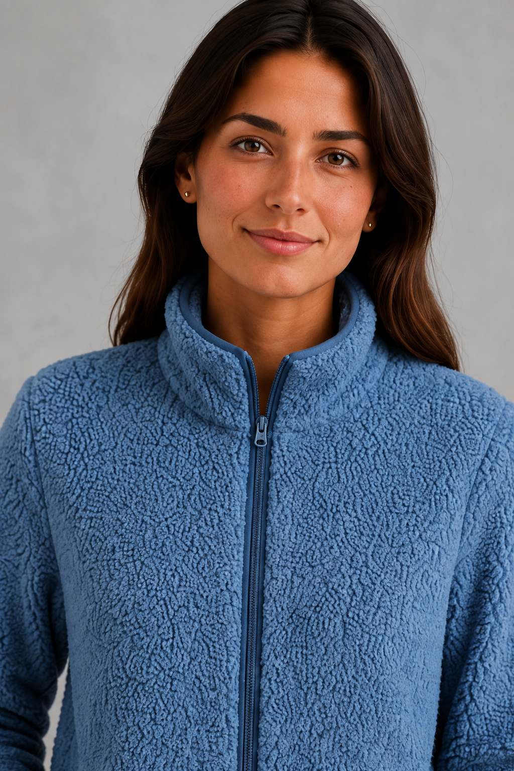 Women’s zip-up sherpa teddy jacket with a soft plush texture, relaxed silhouette and cozy fleece construction for everyday cold-weather layering.