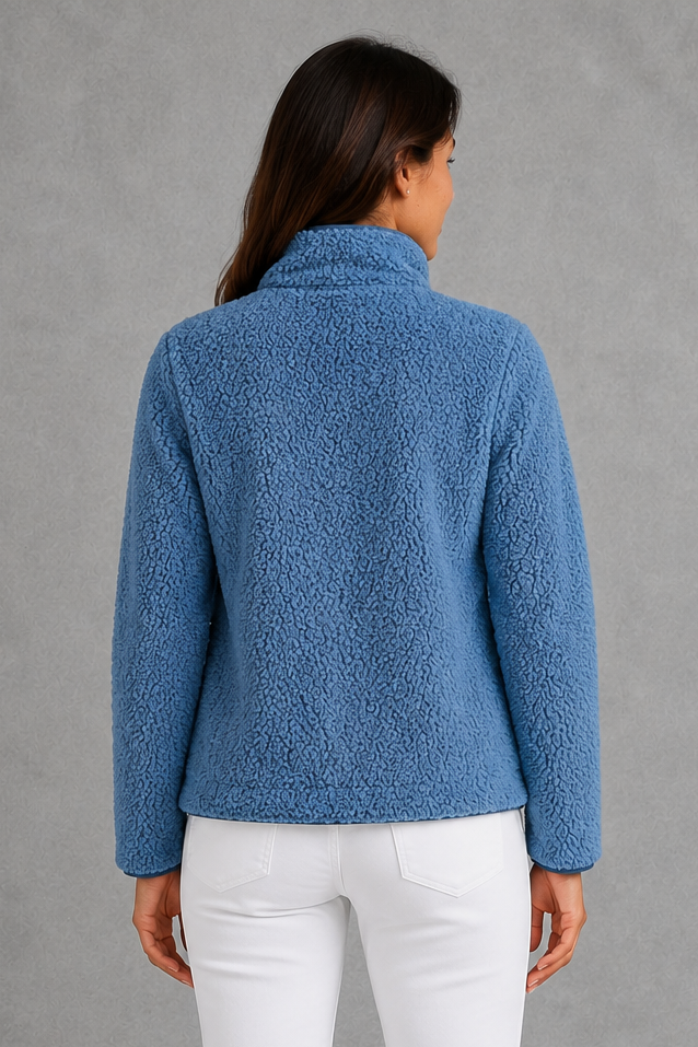 Women’s zip-up sherpa teddy jacket with a soft plush texture, relaxed silhouette and cozy fleece construction for everyday cold-weather layering.