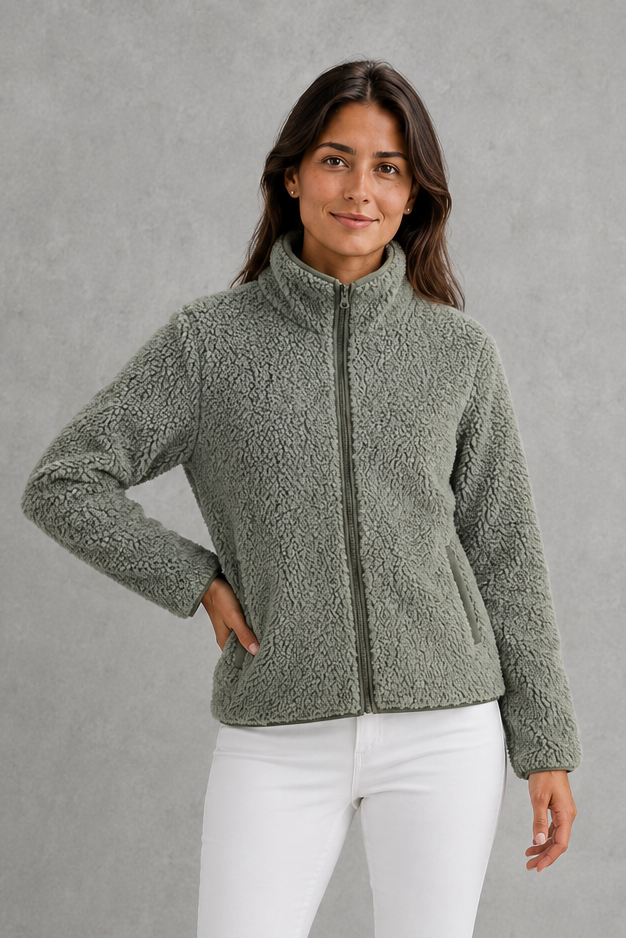 Women’s zip-up sherpa teddy jacket with a soft plush texture, relaxed silhouette and cozy fleece construction for everyday cold-weather layering.