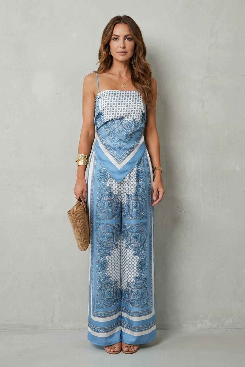 Printed two-piece set styled with heeled sandals and gold accessories